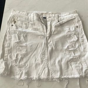 Distressed denim mini skirt